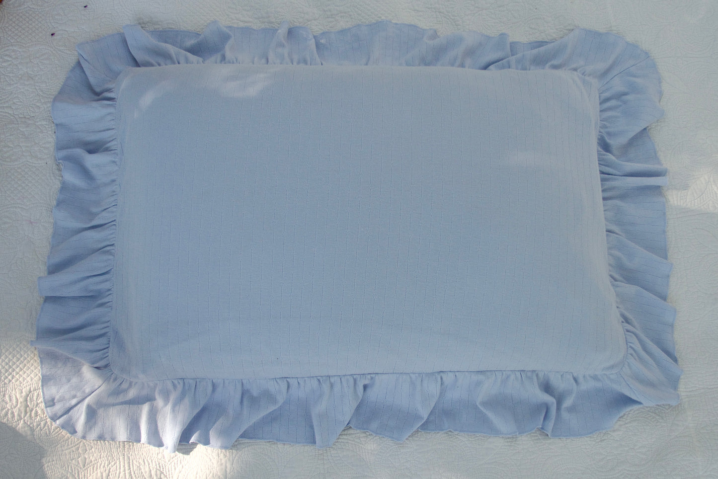 pima ruffle pillowcase . forget-me-not pointelle