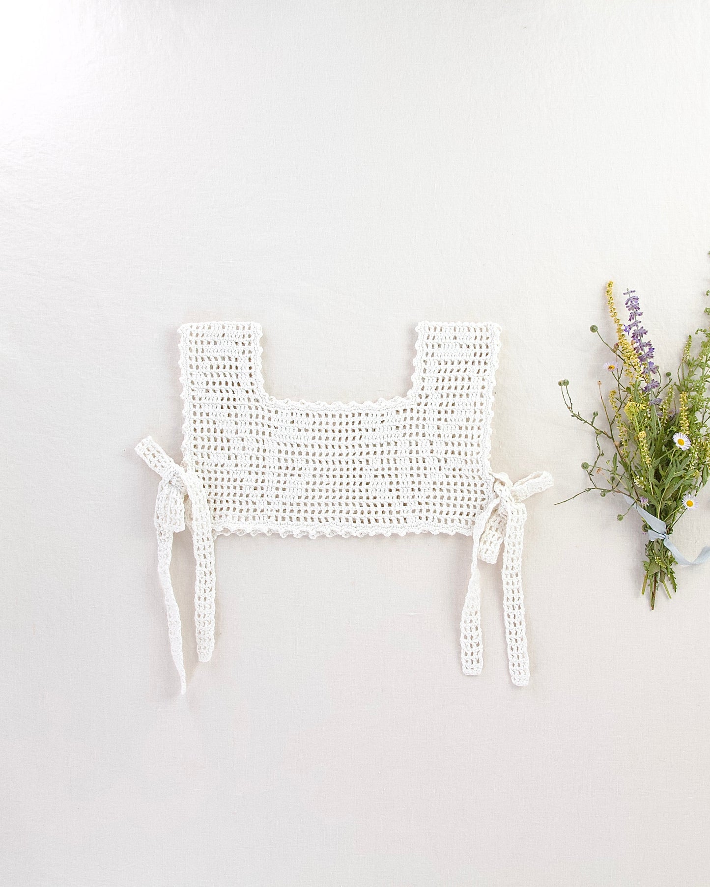 botanical crochet pinny . ivory