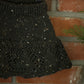 lace yoke skirted bloomer . coal tweed