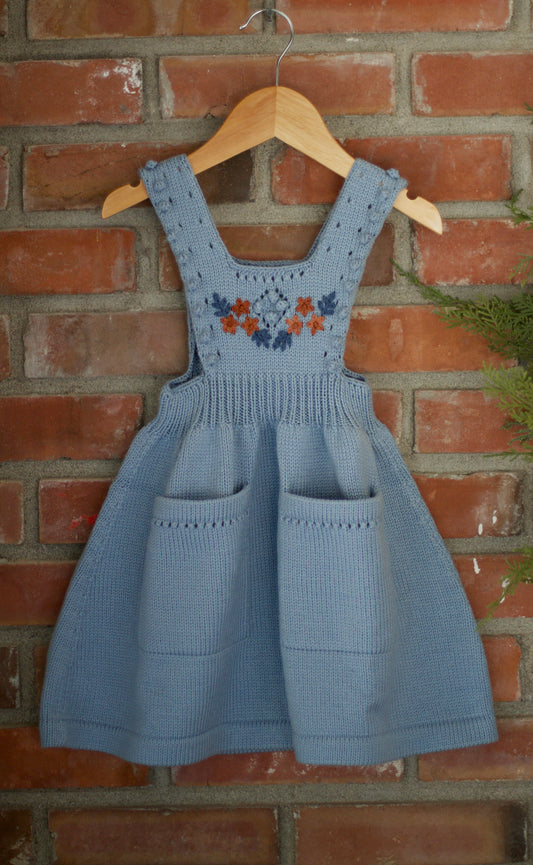 floral embroidered pinafore . chambray