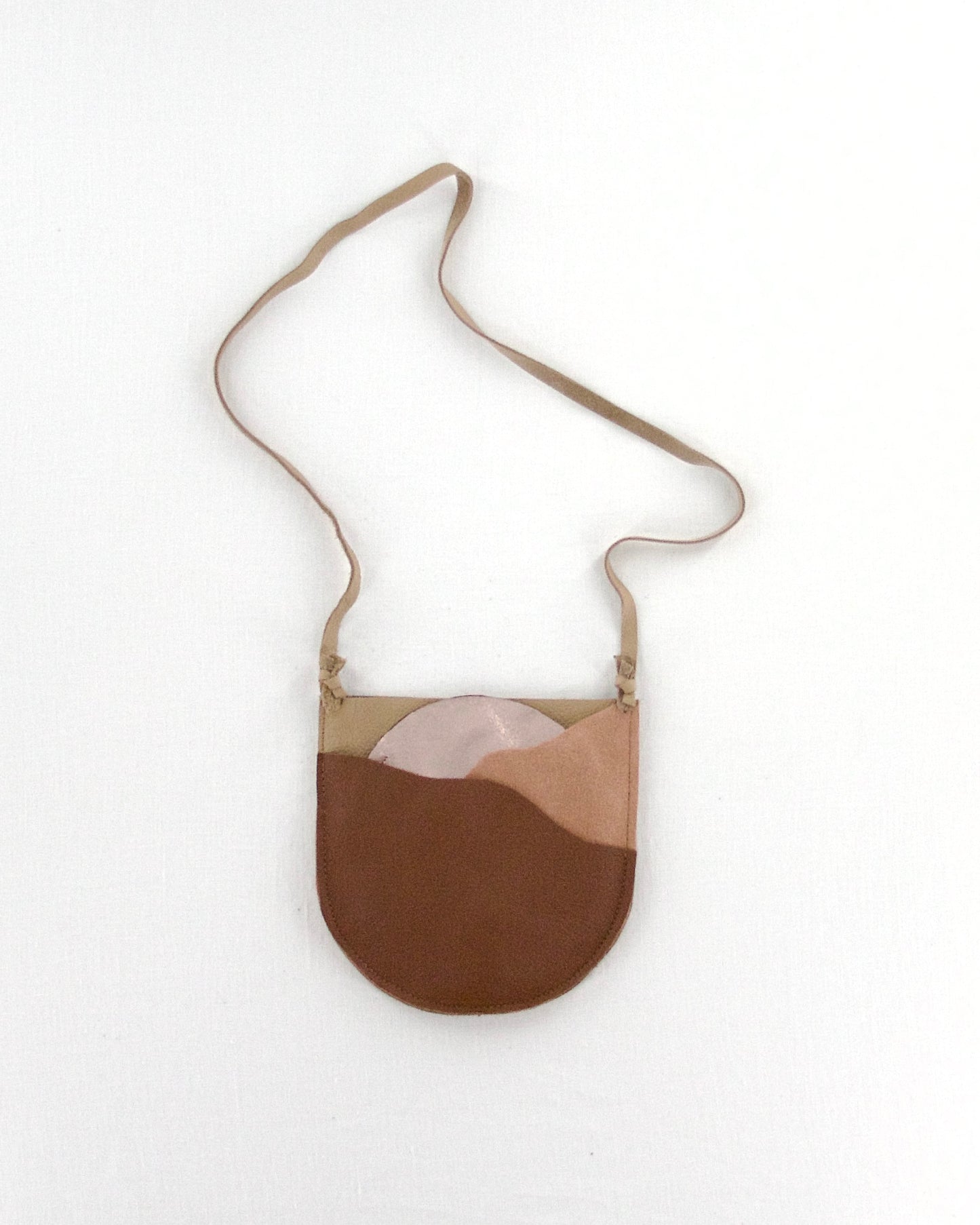 Manimal rising sun pouch