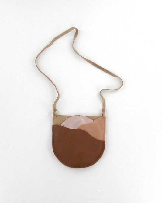 Manimal rising sun pouch