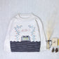 cross-stitch pullover . cream