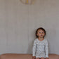 pima ruched ballet gown . cream folk quilt