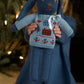 doll cross-stitch pullover . chambray